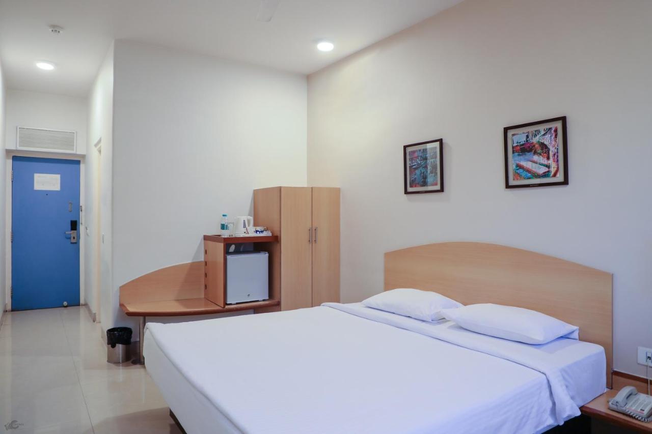 Ginger Tirupur Hotel Bagian luar foto