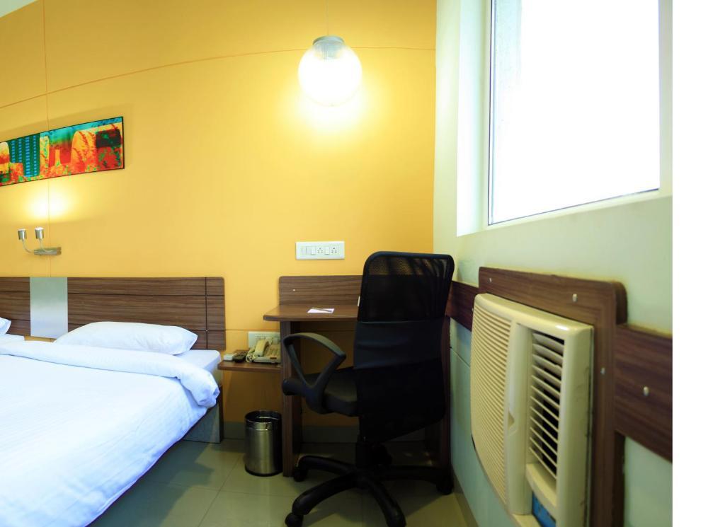 Ginger Tirupur Hotel Bagian luar foto